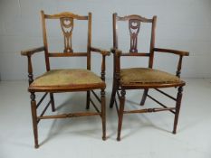 Pair of Antique open arm side chairs with pierced splat back.