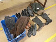 Selection of military shoes and trousers