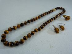18" string of 8.5mm Tigers eye stones with magnetic clasp along with Matching Silver gilt ring and