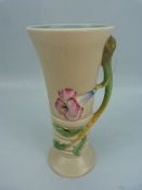 Clarice Cliff shape no 905, Newport vase with moulded flowers, leaves and a branch shape handle