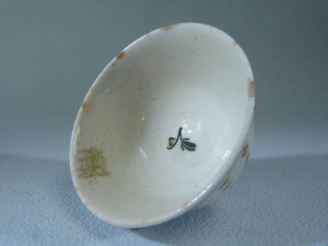 Miniature (unmarked) Sake cup. Decorated in underglaze Ochre, Green and Pink with floral stripes. - Image 2 of 3