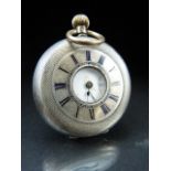 Silver cased 800 marked half hunter pocket watch with engine turned decoration and subsidiary second