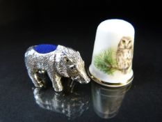 Silver Pig pin cushion and a thimble decorated with an owl