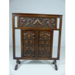 Arts and Crafts oak carved Fire screen - decorated with three panels depicting Tulips and pierced