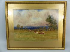 J Atkinson - Watercolour of cattle in a field . Signed Lower right and titled to back 'Summer Time'.