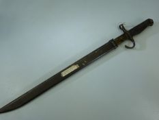 WW2 Arisaka Japanese Bayonet with hooked with wooden handle and metal scabbard. 39cm