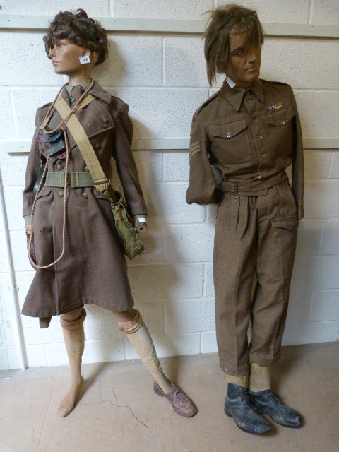 MILITARIA - Two mannequins dressed in military uniforms. Lady and a Man.