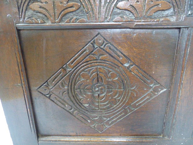 Antique carved coffer on plank feet - Image 4 of 7