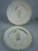 Pair of Poole Pottery plates decorated in the HJ pattern of seahorses.c.1950's One in blues and