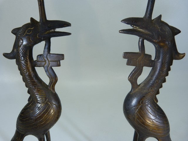 Bronze candlesticks modelled as a pair of cranes standing upon the back of Tortoises. Poss Chinese. - Image 2 of 3