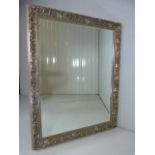 Large silver framed with foliate detail wall mirror