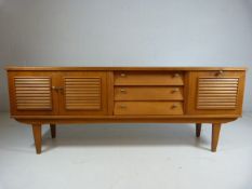 Mid Century sideboard with cupboard, drinks cabinet and three drawers, all with slatted design