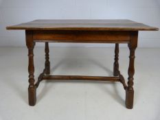 Arts and Crafts oak side table with two sliding panels and planked top