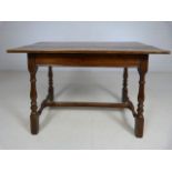 Arts and Crafts oak side table with two sliding panels and planked top