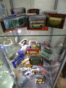 Model buses over three shelves - mainly all boxed