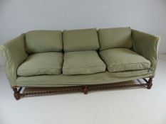 Antique upholstered sofa with barley twist frame legs