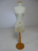 Vintage dress stand on wooden base in the form of a mannequin