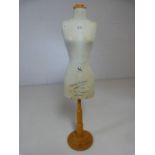 Vintage dress stand on wooden base in the form of a mannequin