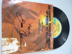 Joe Cocker - A signed 45 ( the sleeve bearing the signature)