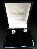 White gold pair of Diamond Solitaire stud earrings of approx 1.37ct