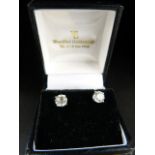 White gold pair of Diamond Solitaire stud earrings of approx 1.37ct