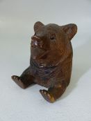 Black Forest inkwell in the form of a bear set with glass eyes.