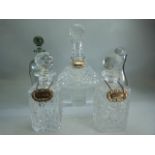 Three large decanters with labels and an unusual probably Danish Holmegaard Glass decanter with