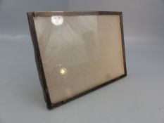 Hallmarked silver photo frame with engine turned decoration