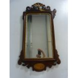 Antique mirror with shell inlay and bird motif to top