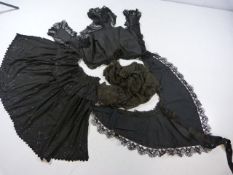 Victorian Mourning garments . All black and adorned with jet beads in floral patterns. To include