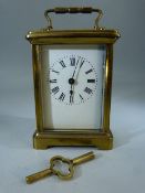 French Brass carriage clock - small amount of damage to top.