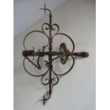 Extremely large four armed wrought iron candle chandelier