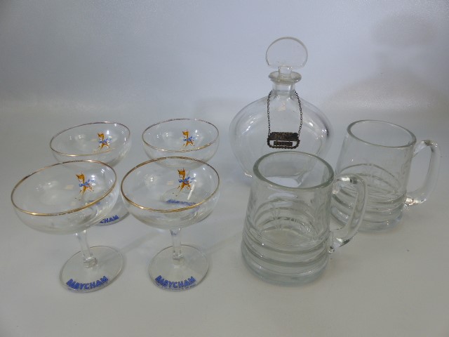 Two antique glass half pint tankards with etched Royal mark to front. Along with an Orrefors