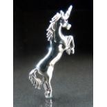 Silver (Sterling) brooch in the form of a unicorn.