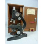 Watson Barnet Cased microscope with chrome mounts and paperwork to door.