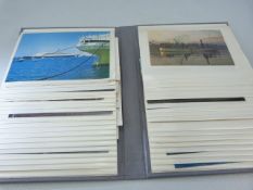 Album containing postcards of ships