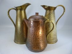 Pair of Brass 'Snake Skin' jugs by J S & S along with one other