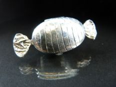 Hallmarked silver (925) pill box in the form of a sweet. Approx weight - 14.1g