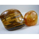 Gemstones - Large chunk of Amber and a Large Tigers eye stone