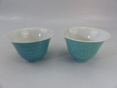 Chinese Celedon glazed bowls with four figure character marks to base