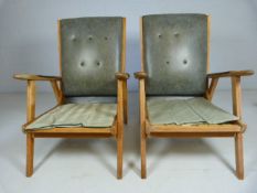 Mid Century pair of low leatherette teak armchairs