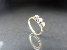 18ct gold three stone diamond ring