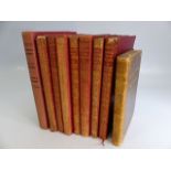 RUDYARD KIPLING - Set of seven red calf leather bound books to include The Day's Work, The Seven