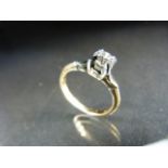 18ct and 14ct Gold ring set with a single stone diamond