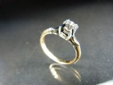 18ct and 14ct Gold ring set with a single stone diamond