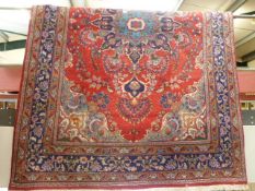 Large Red ground oriental carpet