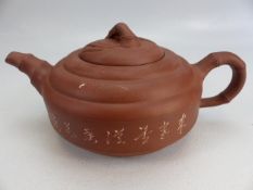 Chinese Yixing clay teapot with four character marks to base
