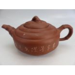 Chinese Yixing clay teapot with four character marks to base