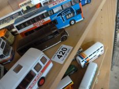Large selection of Loose Die cast buses over five shelves