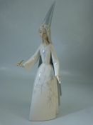 Lladro figure of a fairy godmother with hat and wand